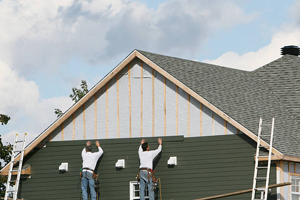 Professional Emergency Siding Repair technician working in Elgin, TX